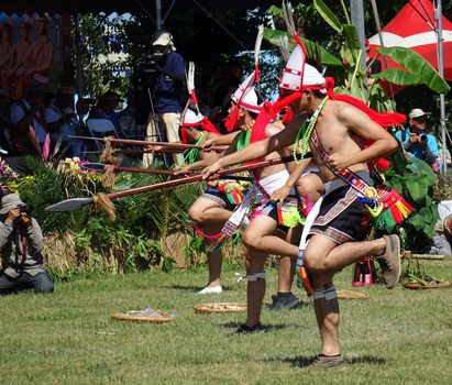 KAOHSIUNG, TAIWAN -- SEPTEMBER 29, 2018: Members of the indigenous Amis tribe in traditional costumes participate in the yearly harvest festival.