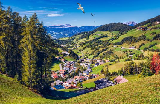Santa Maddalena (Santa Magdalena) village with magical Dolomites mountains in background, Val di Funes valley, Trentino Alto Adige region, South Tyrol, Italy, Europe. Santa Maddalena Village, Italy. 