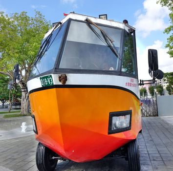 KAOHSIUNG, TAIWAN -- JUNE 10, 2018: This amphibious tourist bus shows visitors to Kaohsiung its attractions from land and from water.
