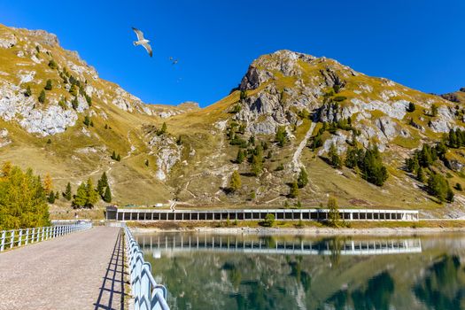 Lago Fedaia (Fedaia Lake), Fassa Valley, Trentino Alto Adige, an artificial lake and a dam near Canazei city, located at the foot of Marmolada massif. Fedaia Lake is the Province of Belluno, Italy.