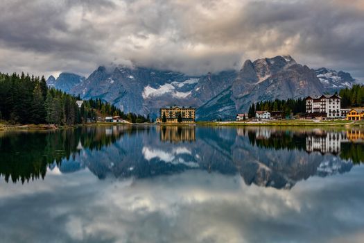 Lake Misurina or Lago di Misurina Italy. Misurina Lake with perfect sky reflection in calm water. Stunning view on the majestic Dolomites Alp Mountains, Italy, National Park Tre Cime di Lavaredo.