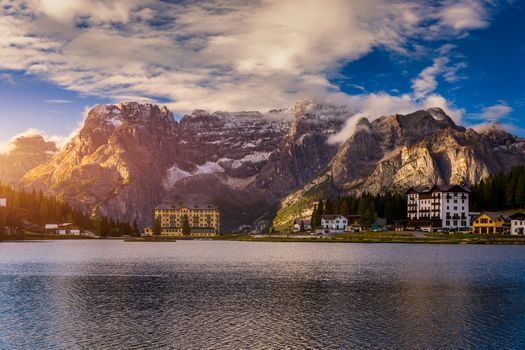 Tre Cime di Lavaredo peaks seen from Misurina lake in Dolomites, Italy in winter, Belluno-Trentino Alto Adige border. Misurina lake, Tre Cime di Lavaredo, Auronzo, Dolomiti, South Tyrol, Italy.