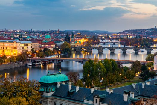 Charles Bridge in Prague in Czechia. Prague, Czech Republic. Charles Bridge (Karluv Most) and Old Town Tower. Vltava River and Charles Bridge. Concept of world travel, sightseeing and tourism.