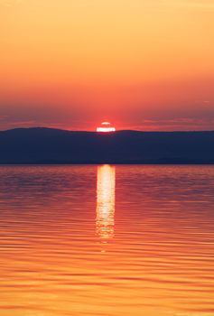 Beautiful sunset or sunrise above the sea. Tropical sunset or sunrise over sea. Colourful sunset or sunrise over water.