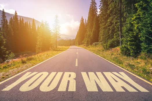 Your way text written on road in the mountains