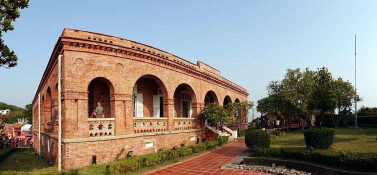 KAOHSIUNG, TAIWAN -- JANUARY 1, 2015: Tourists visit the former British Consulate, which was originally built in 1865 and has recently been restored.