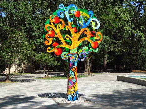 Almaty, Kazakhstan - August 11, 2019: Apple tree icon in the Public Park 