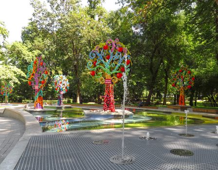 Almaty, Kazakhstan - August 11, 2019: Apple trees icon in the Public Park