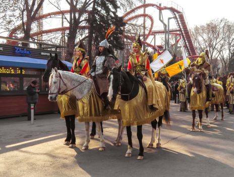 Almaty, Kazakhstan - March 21, 2019: Local people on the horses at national folkloric show Nauryz in Almaty, Kazakhstan