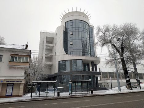 Almaty, Kazakhstan - February 1, 2019: Modern architecture of the city of Almaty. The building is located on Abylay Khan Avenue. It was built in 2018.