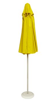Yellow beach umbrella isolated. Clipping path included.