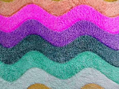 Colorful background of bath mat closeup