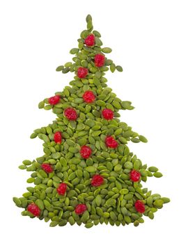 Christmass spruce made from pumpkin seeds isolated on white. Clipping Path included.