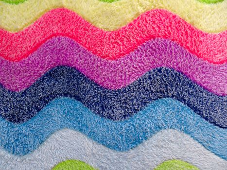 Colorful background of bath mat closeup