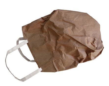 Crumpled paper bag isolated on white. Photo with clipping path.