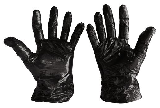 Disposable black plastic gloves isolated on white. Clipping path included.