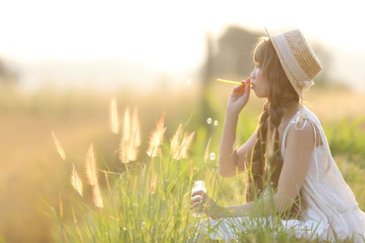 Asian girl on wheat