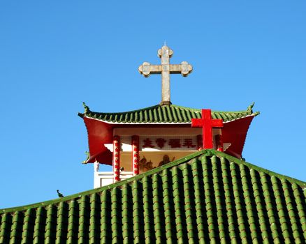 KAOHSIUNG, TAIWAN -- OCTOBER 13, 2013: The Holy Love Catholic church in Kaohsiung combines Chinese architecture with Christian symbols.