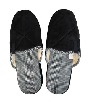 Woolen black slippers isolated on white background. Clipping Path included.