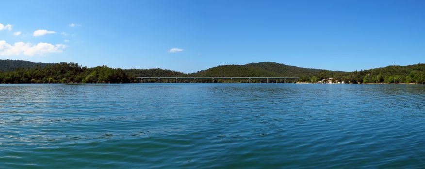 Lake St Cassien in the South of France with beautiful blue sky and water