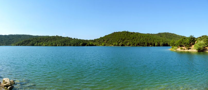 Lake St Cassien in the South of France with beautiful blue sky and water