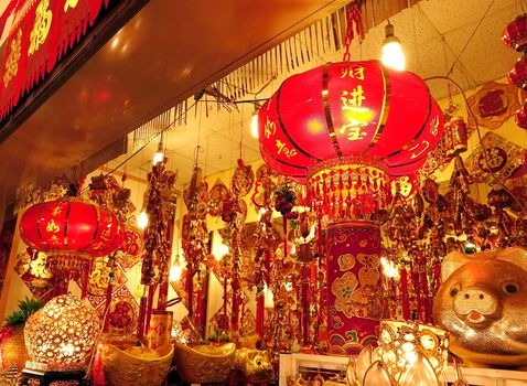 KAOHSIUNG, TAIWAN -- JANUARY 22, 2015: A large store sells colorful decorations, lanterns, lucky charms, paper cuts and printed couplets and proverbs for the Chinese New Year.