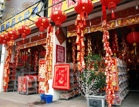 KAOHSIUNG, TAIWAN - JANUARY 22: With Chinese New Year approaching stores sell New Year decorations. This store offers lanterns, firecrackers, posters and other designs on January 22, 2013 in Kaohsiung.