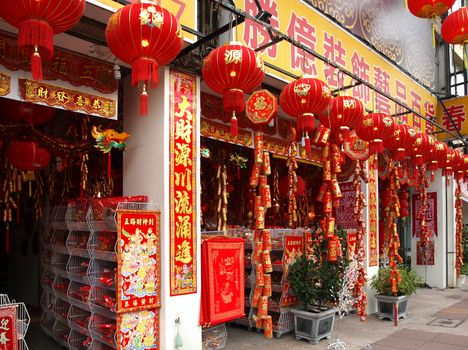 KAOHSIUNG, TAIWAN - JANUARY 22: With Chinese New Year approaching stores sell New Year decorations. This store offers lanterns, firecrackers, posters and other designs on January 22, 2013 in Kaohsiung.