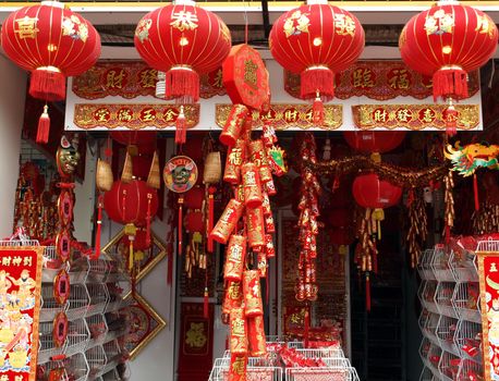 KAOHSIUNG, TAIWAN - JANUARY 22: With Chinese New Year approaching stores sell New Year decorations. This store offers lanterns, firecrackers, posters and other designs on January 22, 2013 in Kaohsiung.