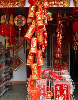 KAOHSIUNG, TAIWAN - JANUARY 22: With Chinese New Year approaching stores sell New Year decorations. This store offers lanterns, firecrackers, posters and other designs on January 22, 2013 in Kaohsiung.