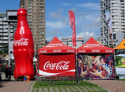 KAOHSIUNG, TAIWAN -- JUNE 7, 2019: A promotional tent and display for Coca-Cola beverages at the Dragon Boat Festival
