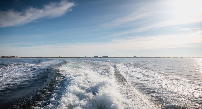 view of water jet seen behind the speed boat