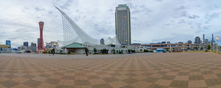 Kobe, Japan - October 11, 2019: Sunset panorama of the Meriken Park, with locals and visitors, Kobe, Japan