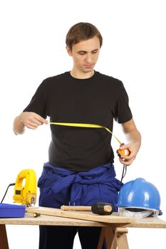 Man working with tools and wood. Over white.