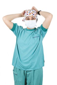 Female nurse putting on her mask, isolated on white background.