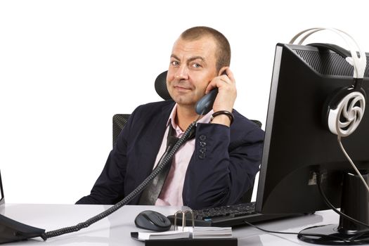 Businessman holding the telephone over white.