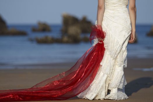 Bride with red ribbon.