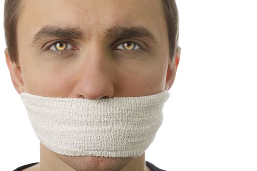 Young man with bandage covering his mouth. Isolated on white background.