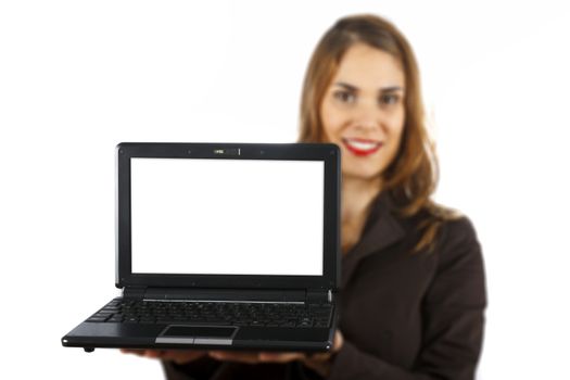 Businesswoman out of focus at background showing a laptop with white display. Isolated on white background.