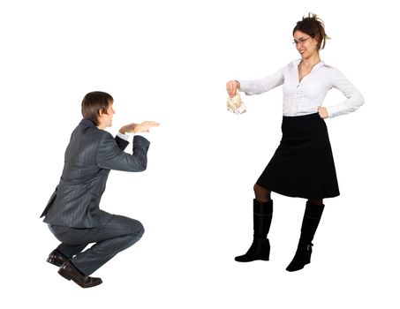 Young business woman feeding a business man like if he was a dog.