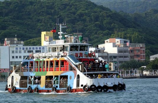 KAOHSIUNG, TAIWAN -- JANUARY 1, 2015: The Kaohsiung cross-harbor ferry transports tourists across the bay to Chijin Island.