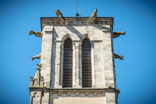 detail of the bell tower of the Saint Jean-Baptiste church in Montaigu, France
