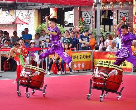 KAOHSIUNG, TAIWAN -- MAY 26, 2019: A junior high school percussion group performs at the Qing Yun Temple in the Dashe District of Kaohsiung City.