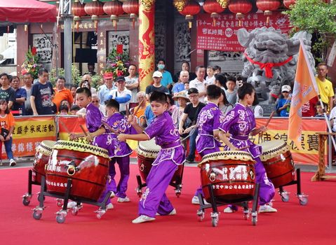 KAOHSIUNG, TAIWAN -- MAY 26, 2019: A junior high school percussion group performs at the Qing Yun Temple in the Dashe District of Kaohsiung City.