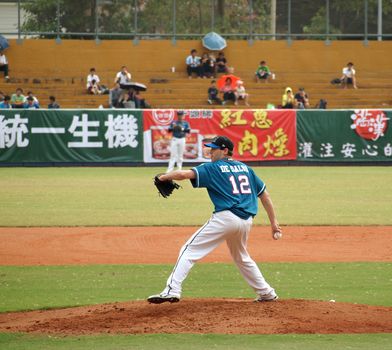 PINGTUNG, TAIWAN, APRIL 8: Pitcher De Salvo of the Lamigo Monkeys in action in a game of the Pro Baseball League against the President Lions. The Lions won 2:0 on April 8, 2012 in Pingtung. 