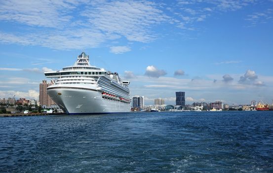 KAOHSIUNG, TAIWAN -- MAY 11, 2014:  The gem class cruise ship Diamond Princess with more than 2000 passengers on board docks at Kaohsiung Harbor.