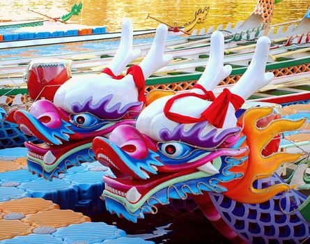 KAOHSIUNG, TAIWAN - JUNE 11: Decorated dragon boats on the Love River in Kaohsiung are ready for the Dragon Boat Festival on June 11, 2013 in Kaohsiung