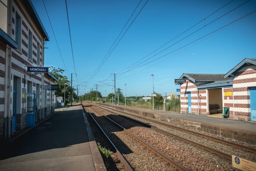 Montaigu, France - August 2, 2018: Architectural detail of the small Montaigu train station on a summer day