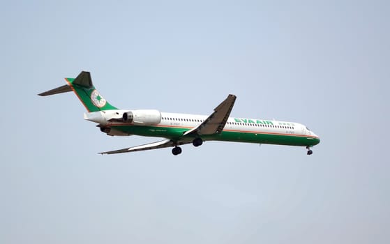 KAOHSIUNG, TAIWAN -- MARCH 23, 2014: An EVA Airlines jetliner prepares to land at Kaohsiung International Airport.