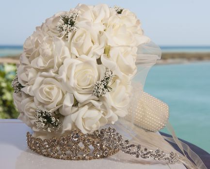 Closeup detail of brides bouquet posy bunch of flowers on table